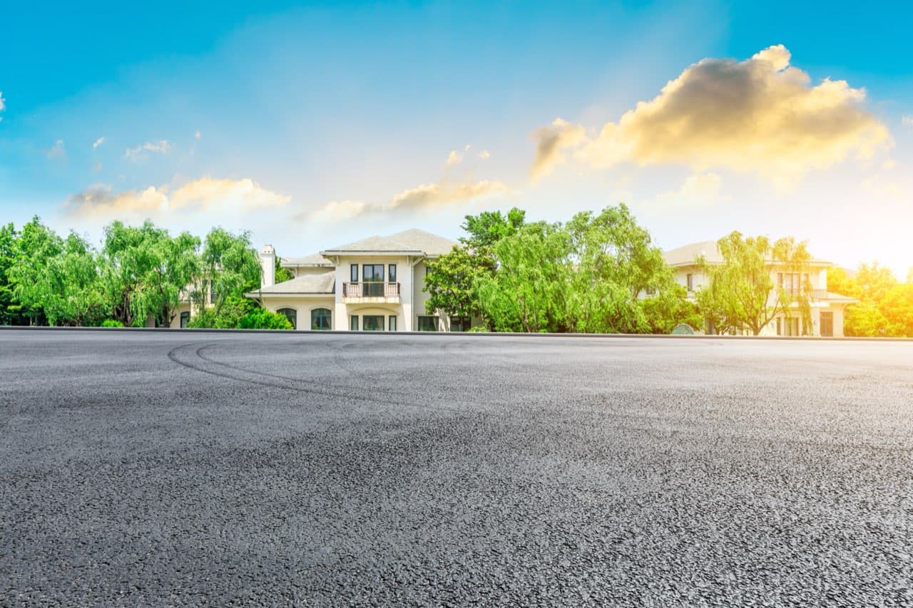 Smooth paved driveway at dusk